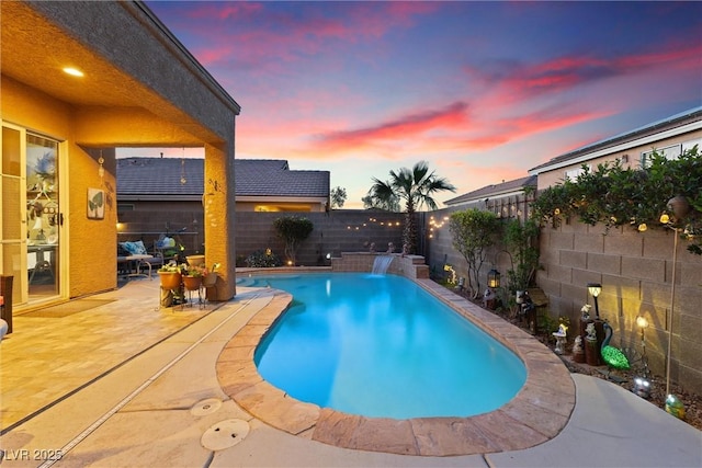 648 Sunrise Lake Pl, Henderson, NV 89002 - pool at dusk featuring a fenced in pool, a fenced backyard, and a patio area