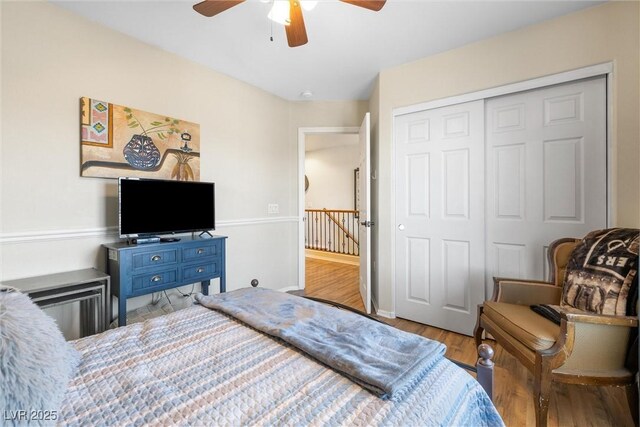 648 Sunrise Lake Pl, Henderson, NV 89002 - bedroom featuring a closet, ceiling fan, and wood finished floors