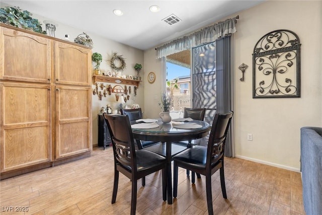 648 Sunrise Lake Pl, Henderson, NV 89002 - dining area with visible vents, recessed lighting, light wood finished floors, and baseboards