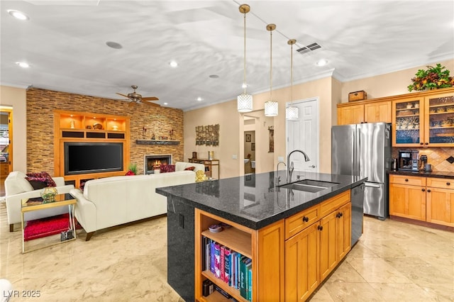 9 Contra Costa Pl, Henderson, NV 89052 - kitchen featuring recessed lighting, appliances with stainless steel finishes, ornamental molding, and a sink