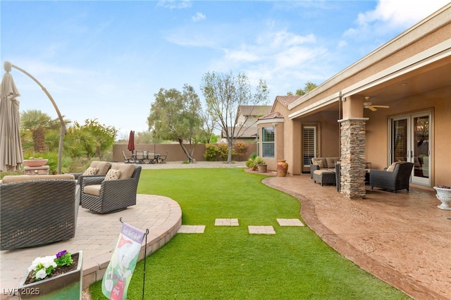 9 Contra Costa Pl, Henderson, NV 89052 - view of yard with outdoor lounge area, a patio area, a fenced backyard, and ceiling fan