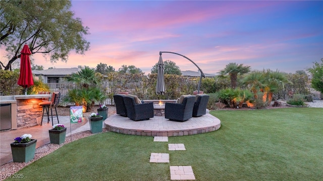 9 Contra Costa Pl, Henderson, NV 89052 - view of yard with outdoor dry bar, a patio, and an outdoor fire pit