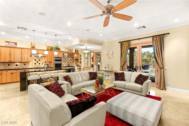 9 Contra Costa Pl, Henderson, NV 89052 - living room featuring ornamental molding, visible vents, recessed lighting, and ceiling fan