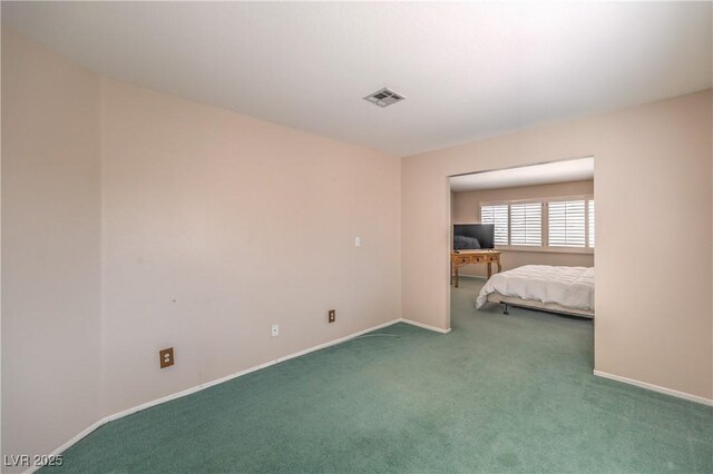 bedroom featuring visible vents, baseboards, and carpet floors