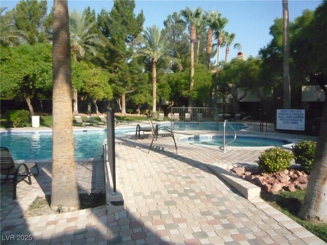 9000 Las Vegas Blvd Unit 1047, Las Vegas, NV 89123 - community pool featuring a patio and a community hot tub