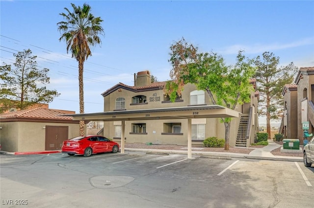 9000 Las Vegas Blvd Unit 1047, Las Vegas, NV 89123 - view of building exterior with stairway and covered parking