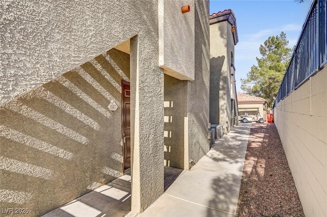 9000 Las Vegas Blvd Unit 1047, Las Vegas, NV 89123 - view of side of home with a tile roof and stucco siding