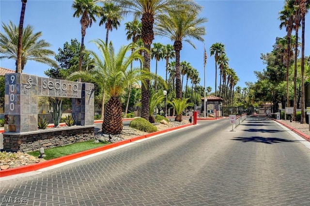 9000 Las Vegas Blvd Unit 1047, Las Vegas, NV 89123 - view of road featuring a gate, curbs, and a gated entry