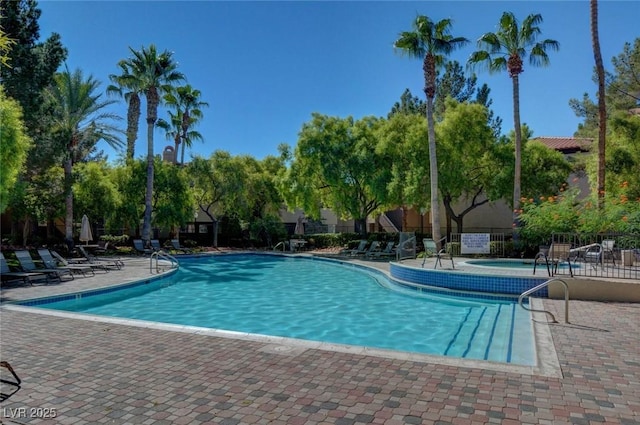 9000 Las Vegas Blvd Unit 1047, Las Vegas, NV 89123 - community pool with a patio and fence