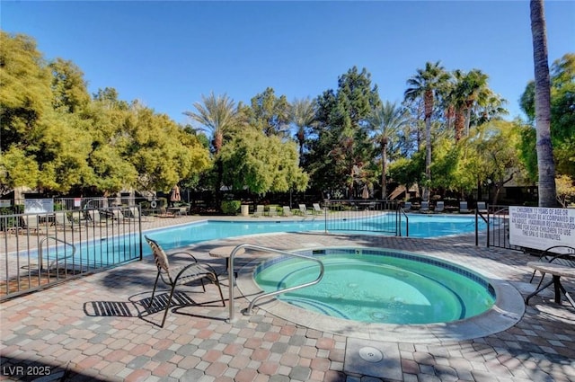 9000 Las Vegas Blvd Unit 1047, Las Vegas, NV 89123 - community pool featuring a patio, fence, and a hot tub