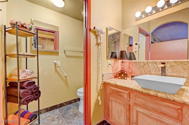 9000 Las Vegas Blvd Unit 1047, Las Vegas, NV 89123 - full bath featuring toilet, stone finish flooring, vanity, and baseboards