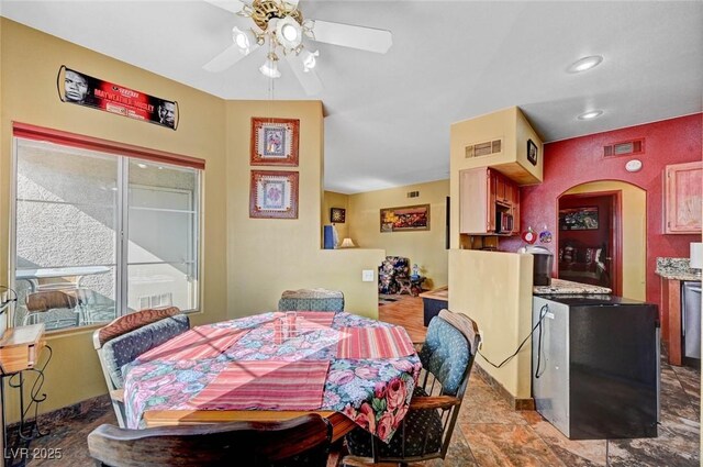 9000 Las Vegas Blvd Unit 1047, Las Vegas, NV 89123 - dining space with visible vents, arched walkways, and ceiling fan