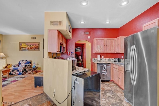 9000 Las Vegas Blvd Unit 1047, Las Vegas, NV 89123 - kitchen with appliances with stainless steel finishes, visible vents, recessed lighting, and arched walkways