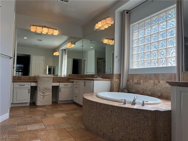 8209 Chapelle Ct, Las Vegas, NV 89131 - full bath featuring plenty of natural light, a garden tub, vanity, and a shower with shower door