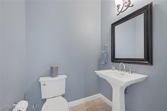 8209 Chapelle Ct, Las Vegas, NV 89131 - half bathroom featuring tile patterned flooring, toilet, and baseboards