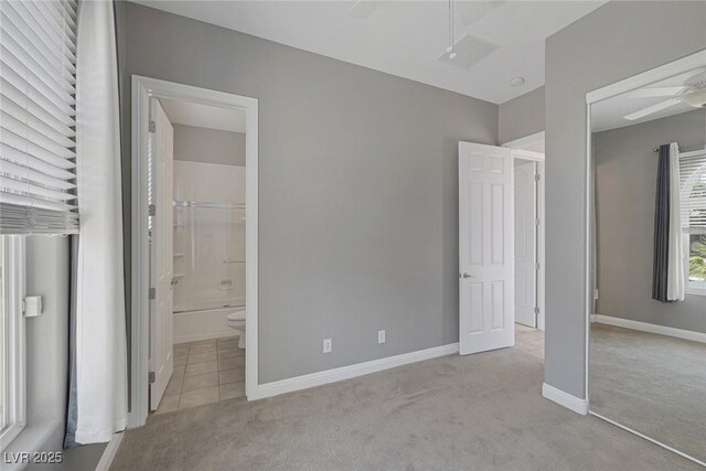 8209 Chapelle Ct, Las Vegas, NV 89131 - unfurnished bedroom with carpet flooring, baseboards, and connected bathroom