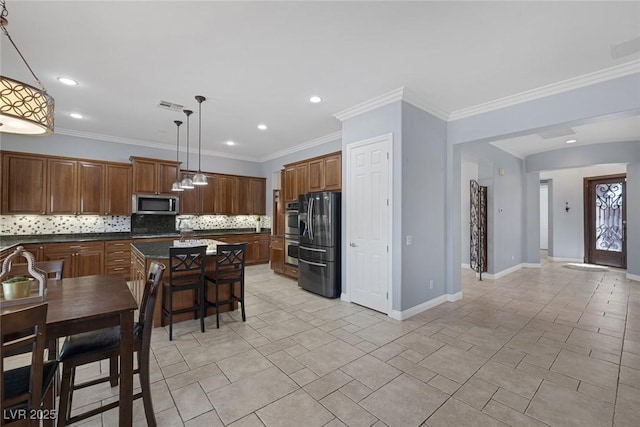 8209 Chapelle Ct, Las Vegas, NV 89131 - kitchen with stainless steel appliances, dark countertops, decorative backsplash, recessed lighting, and a kitchen island