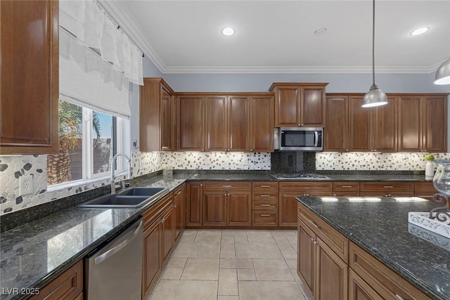 8209 Chapelle Ct, Las Vegas, NV 89131 - kitchen with stainless steel appliances, a sink, pendant lighting, backsplash, and crown molding