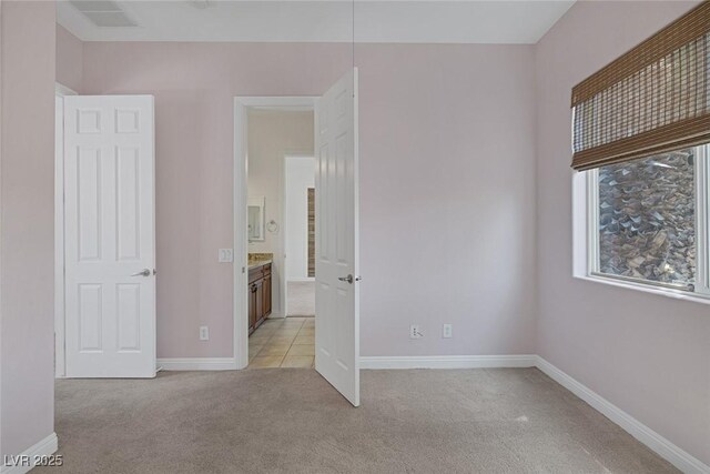 8209 Chapelle Ct, Las Vegas, NV 89131 - unfurnished bedroom with light carpet and baseboards