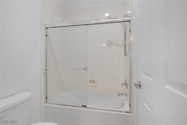 8209 Chapelle Ct, Las Vegas, NV 89131 - bathroom with shower / bath combination with glass door and toilet