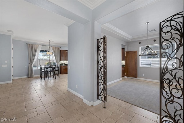 8209 Chapelle Ct, Las Vegas, NV 89131 - foyer featuring a chandelier, crown molding, baseboards, and light tile patterned floors