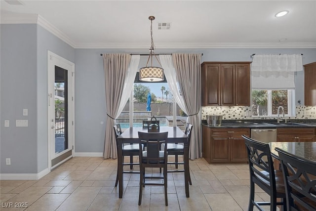 8209 Chapelle Ct, Las Vegas, NV 89131 - dining area with ornamental molding and baseboards