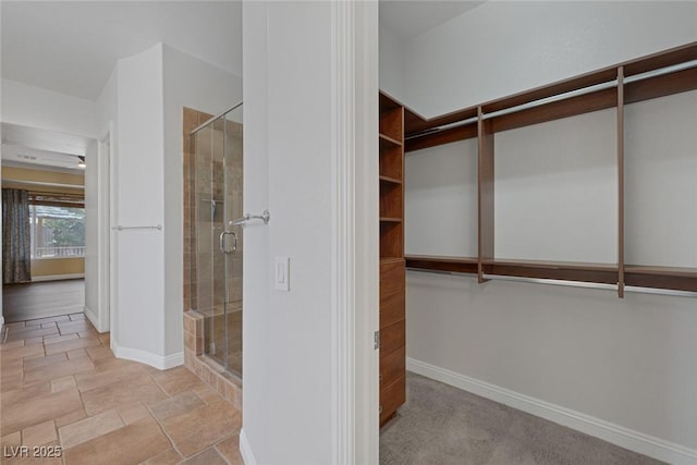 8209 Chapelle Ct, Las Vegas, NV 89131 - spacious closet featuring stone tile floors