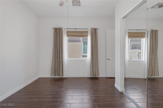 8209 Chapelle Ct, Las Vegas, NV 89131 - unfurnished bedroom with wood finish floors, baseboards, and a ceiling fan
