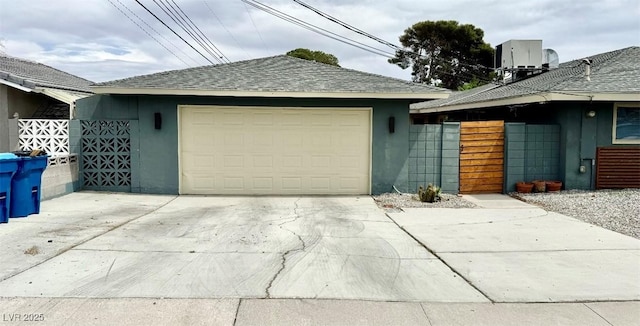 1801 Griffith Ave, Las Vegas, NV 89104 - garage with concrete driveway