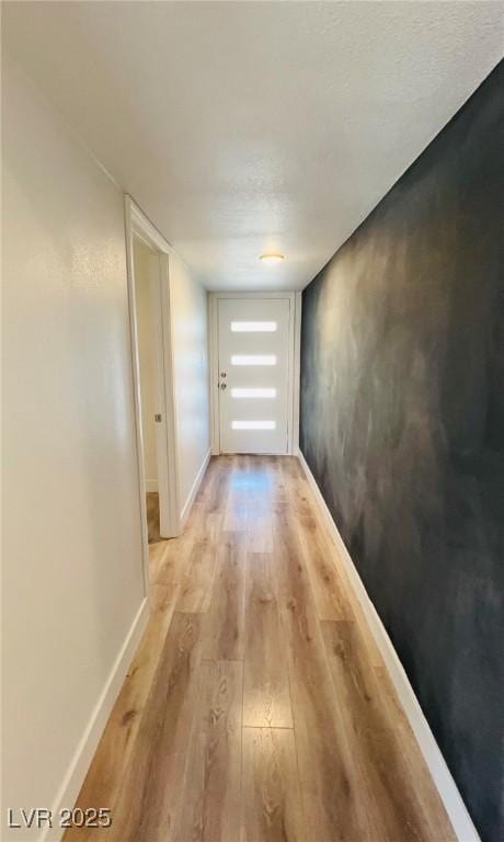 1801 Griffith Ave, Las Vegas, NV 89104 - hall featuring light wood-type flooring and baseboards