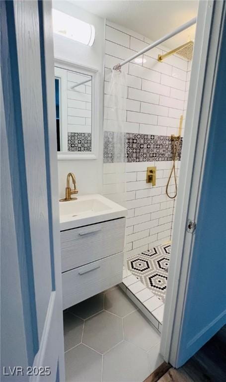 1801 Griffith Ave, Las Vegas, NV 89104 - bathroom featuring vanity, a stall shower, and tile patterned floors