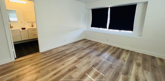 1801 Griffith Ave, Las Vegas, NV 89104 - unfurnished room with light wood-style flooring