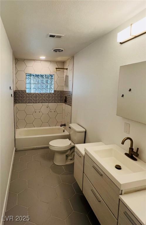 1801 Griffith Ave, Las Vegas, NV 89104 - bathroom with vanity, tile patterned floors, and tub / shower combination