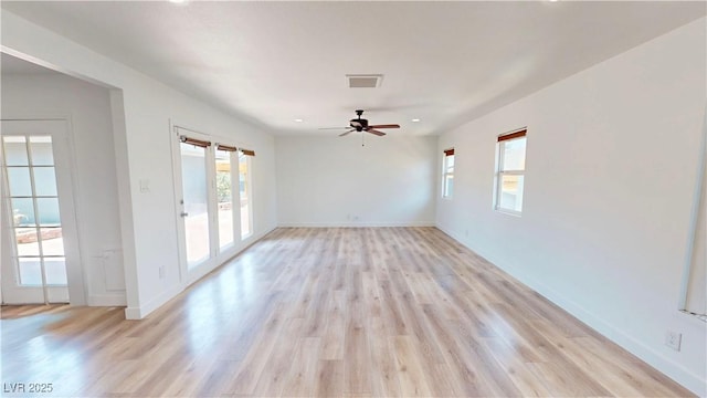 1801 Griffith Ave, Las Vegas, NV 89104 - empty room with healthy amount of natural light, a ceiling fan, light wood-style flooring, and recessed lighting