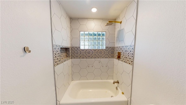 1801 Griffith Ave, Las Vegas, NV 89104 - bathroom featuring shower / bath combination and a textured wall