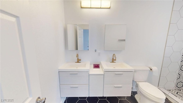 1801 Griffith Ave, Las Vegas, NV 89104 - bathroom with double vanity, a tile shower, and tile patterned flooring