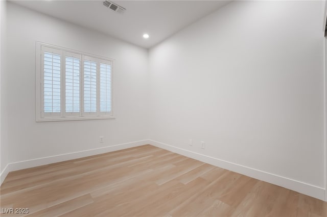 3057 Sunrise Heights Dr, Henderson, NV 89052 - empty room with light wood-style flooring, visible vents, baseboards, and recessed lighting