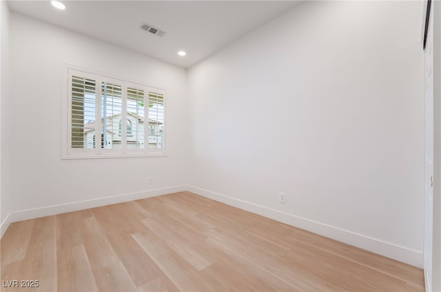 3057 Sunrise Heights Dr, Henderson, NV 89052 - empty room with light wood-type flooring, baseboards, visible vents, and recessed lighting
