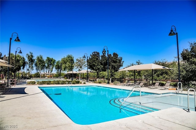 pool with a patio area