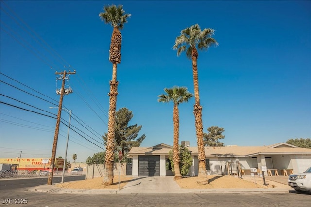 view of front of property featuring an attached garage and driveway