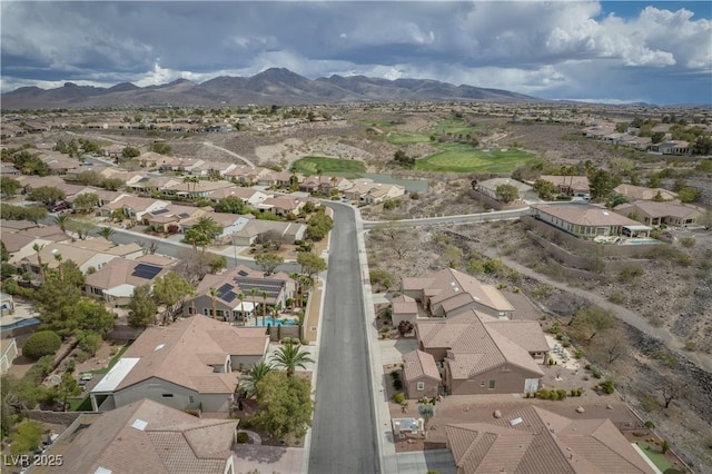 aerial view of residential area with mountains