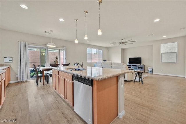 8919 Don Valley Ave, Las Vegas, NV 89148 - kitchen with stainless steel dishwasher, a sink, baseboards, light wood finished floors, and recessed lighting