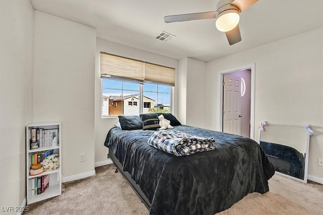 8919 Don Valley Ave, Las Vegas, NV 89148 - bedroom featuring baseboards, light carpet, a ceiling fan, and visible vents