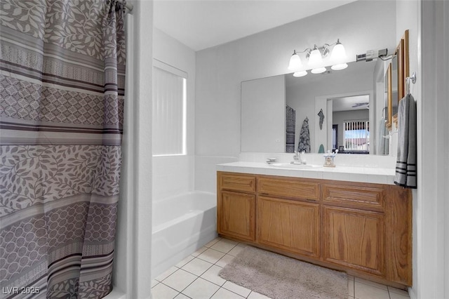 1800 Red Rock Dr, Pahrump, NV 89048 - full bath featuring tile patterned floors, vanity, and a bathtub