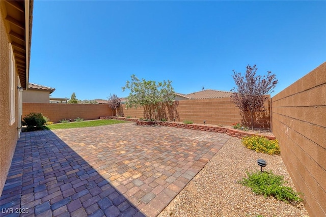 view of patio featuring a fenced backyard