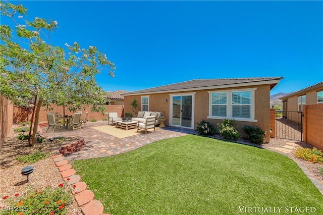 back of property featuring stucco siding, outdoor lounge area, a patio area, and a tiled roof