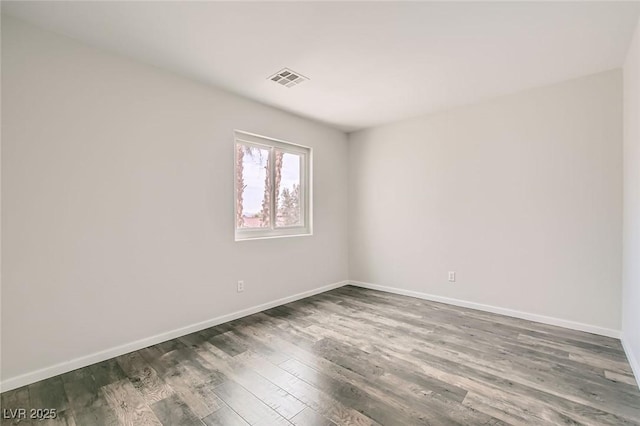 7829 Lovely Pine Pl, Las Vegas, NV 89143 - empty room featuring visible vents, baseboards, and wood finished floors