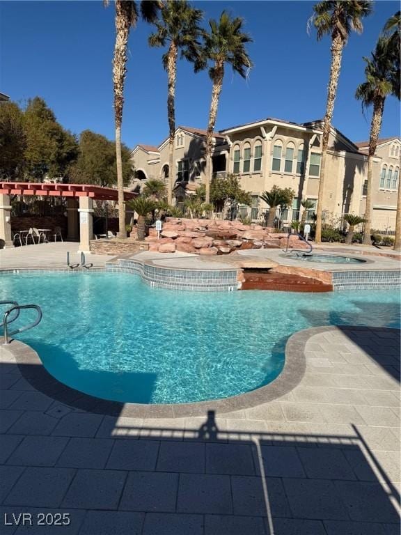 pool featuring a patio