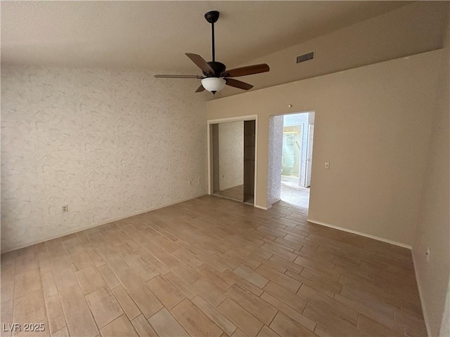 9048 Litchfield Ave, Las Vegas, NV 89134 - empty room with a ceiling fan, wood finished floors, and visible vents