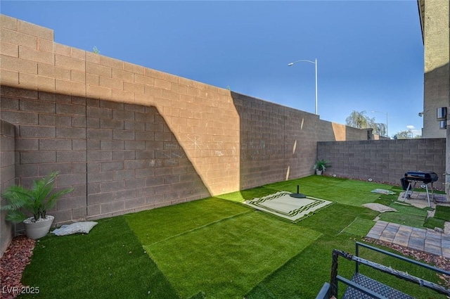 7953 Mountain Lilac St, Las Vegas, NV 89113 - view of yard with a fenced backyard